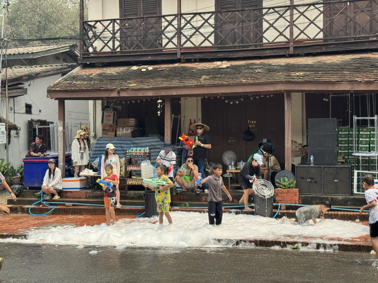 Pi Mai Lao New Year water fight on the streets of Luang Prabang in mid-April