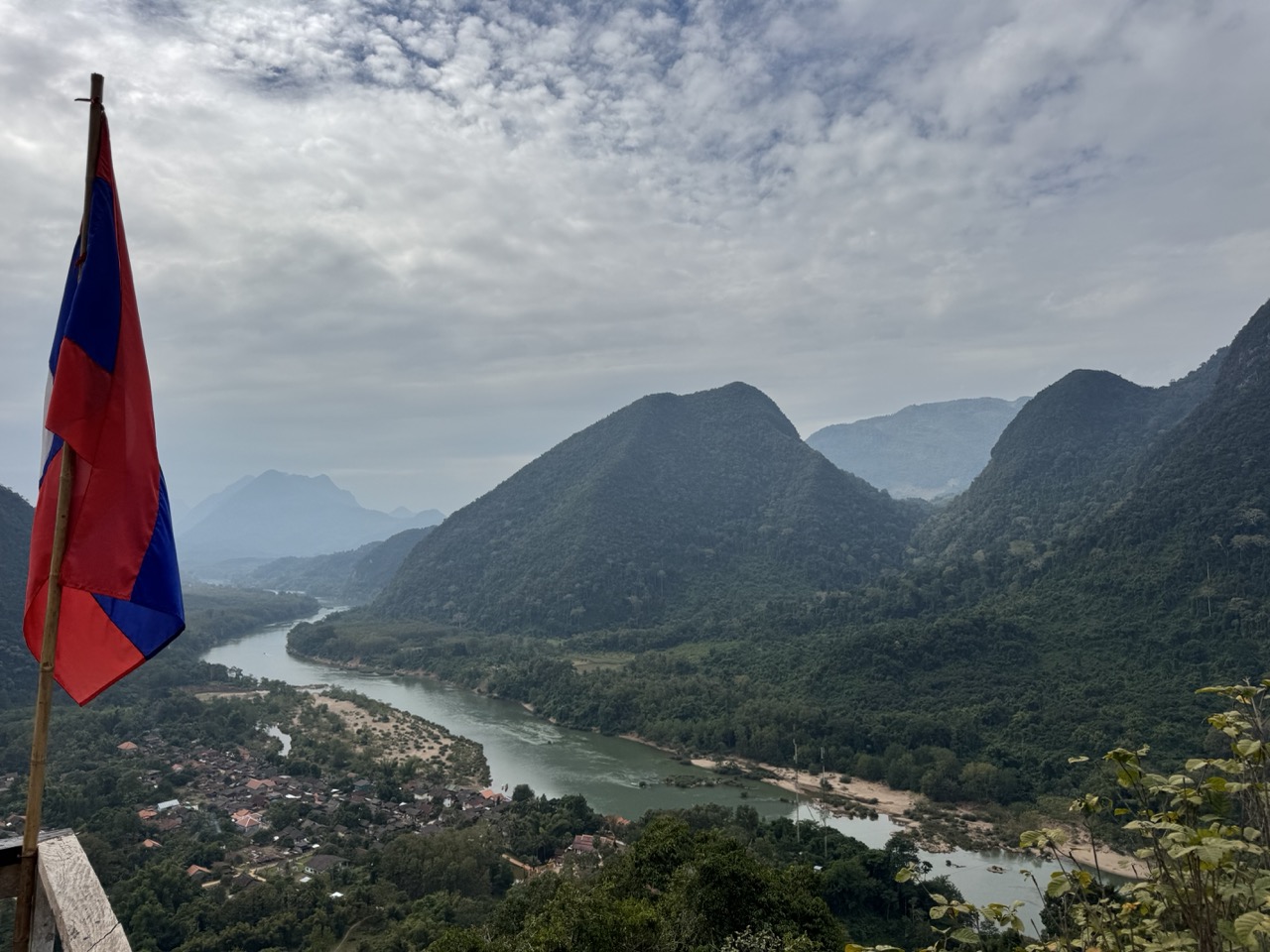 A Lao flag at the Pha Noi viewpoint above Muang Ngoi village
